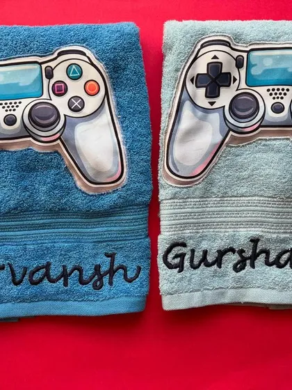 A closer look at our personalised gamer towels. We've embroidered the names 'Gurvansh' and 'Gurshaan' on these fun, high-quality towels.