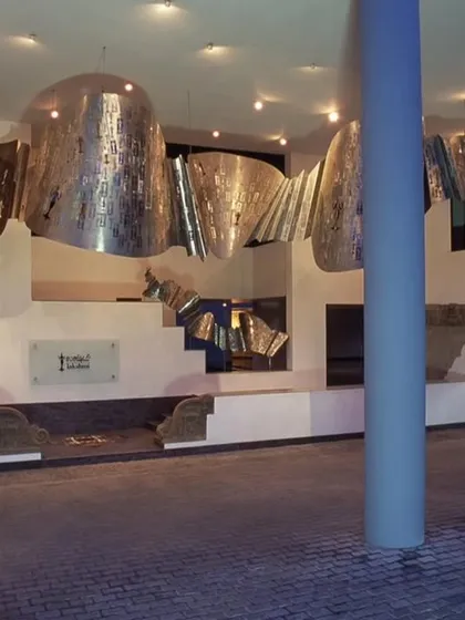 Art is integral to my architectural vision. At the LMW Headquarters in Coimbatore, I collaborated with artist Rajeev Sethi to create this monumental stainless steel 'phataka' sculpture, transforming the corporate lobby into a culturally rich gallery space.