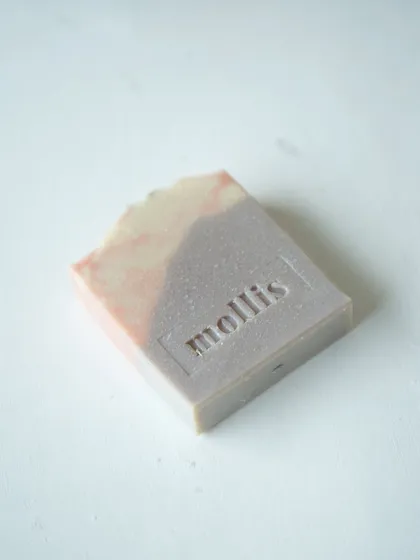 A single bar of Lavender Patchouli, showing the gentle gradient of its natural color.