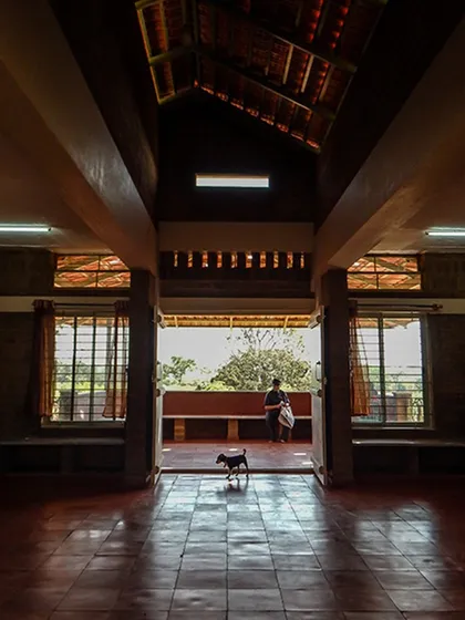 This hall is a powerful example of symmetry, creating a grand and tranquil axis that draws the eye towards the view.