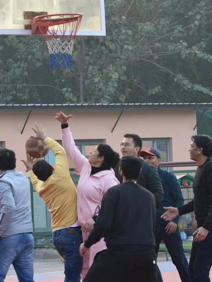 A great rebound during the Parents' Fun Match. The friendly competition made for an unforgettable experience for everyone involved.