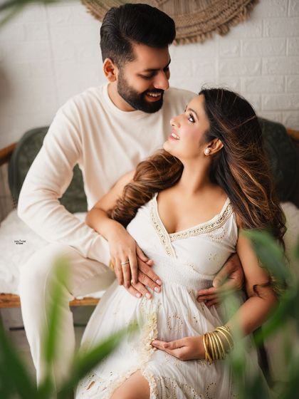 A playful and happy moment in our boho setup. The all-white outfits and the natural textures create a light and airy feel.