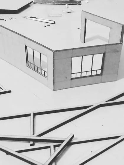 Another view of a work-in-progress architectural model. Building physical models allows me and my clients to visualize and refine details like window placements and wall openings before construction begins.