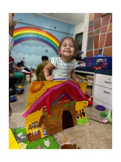 So proud of her Goldilocks and the Three Bears craft project. We combine storytelling with art to make learning multi-sensory and memorable.