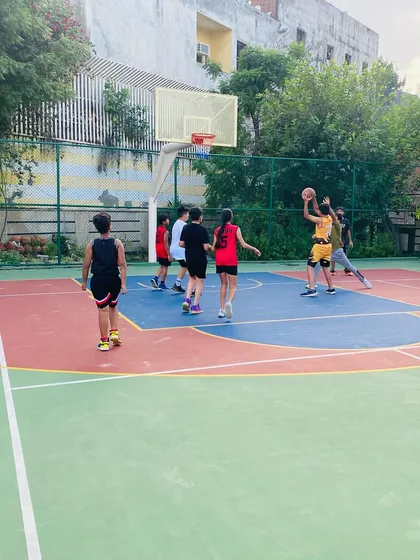 A player takes a shot in the paint.