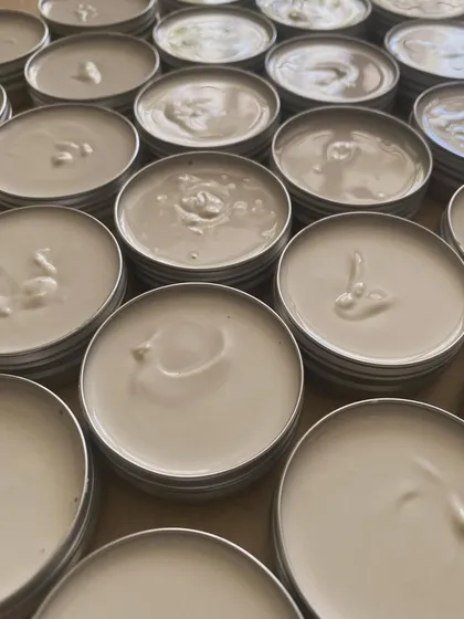 Freshly poured deodorant creams, ready to set. We use a blend of grapeseed oil, mango butter, and candelilla wax to nourish and protect your underarms.