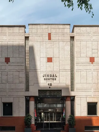 Our restoration of the Jindal Centre in New Delhi involved a complete repair of its 20-year-old Dholpur stone façade, preserving the building's heritage while updating it with modern structural and lighting solutions.