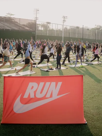 The Nike Run banner in the foreground of our yoga for runners session. It's wonderful to bring the benefits of yoga to different athletic communities.
