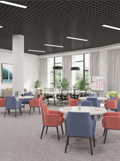 This is a 3D render of a dynamic co-working and breakout area. The open-plan layout encourages collaboration with flexible seating options, including small group tables and casual lounge chairs, all set within a bright, airy space with large windows.