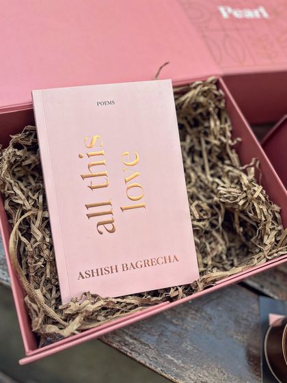 The star of the show: the book "All This Love" nestled in a custom-designed PR box. This simple, elegant presentation puts the product front and center, surrounded by elements that enhance its theme.
