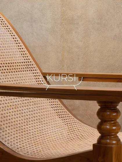 A detail of the turned spindle on my teak rocking chair, a classic woodworking technique that adds a touch of traditional elegance.