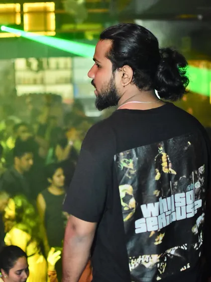 These shots capture me in my element, from different angles and at various events. Each one is a glimpse into my life as a music maker, focused on the craft and connecting with the crowd.