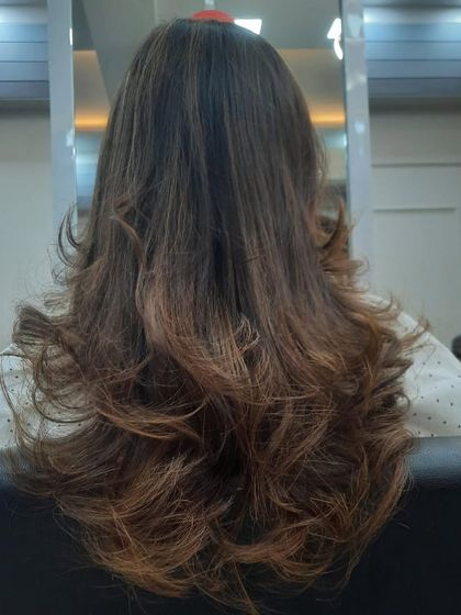 Haircut alert! A beautiful example of a layered cut that adds body and movement to long hair.