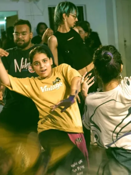 A candid shot capturing the intense focus and energy of a dancer during the Trinity Series workshop with Donny Allstars.
