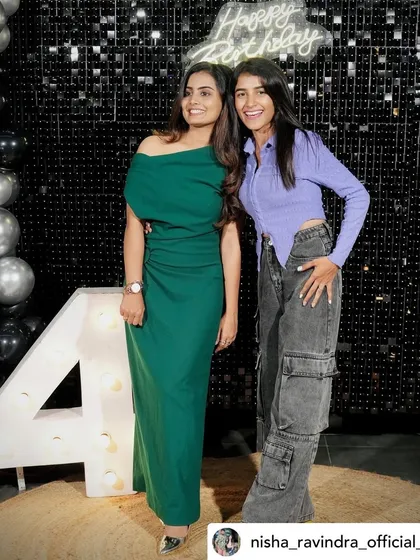 Fun and candid moments from a 24th birthday party, showcasing the modern shimmer wall and marquee number decor.