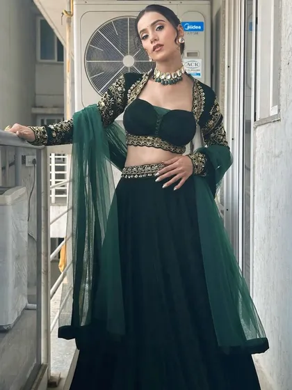 A striking pose that shows off the full silhouette of the outfit and the confidence the look inspires.
