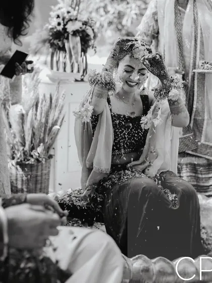 A joyful black and white candid from the Haldi ceremony, proving that emotion is powerful even without color.