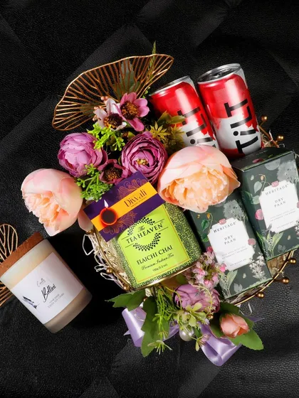 An overhead shot of a curated gift hamper, showcasing my ability to style and photograph products for festive campaigns and e-commerce catalogs.