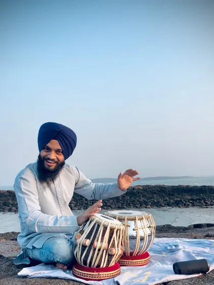 Finding a peaceful spot by the ocean in Mumbai for some riyaz. The natural setting adds a beautiful dimension to the music.