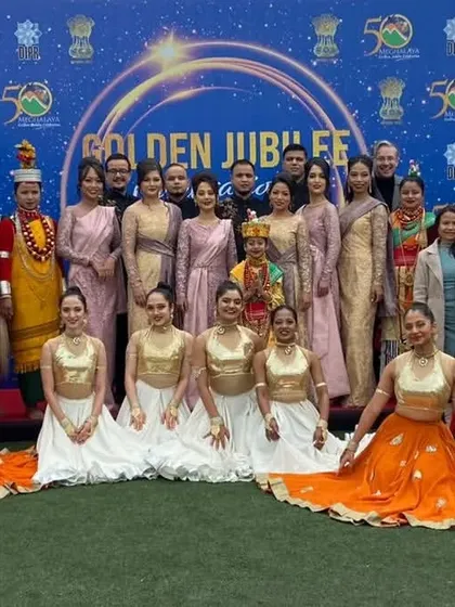 A group photo with the entire cast and crew for Meghalaya's 50th statehood celebration. This event brought together diverse artists in traditional and contemporary costumes for a unified performance.