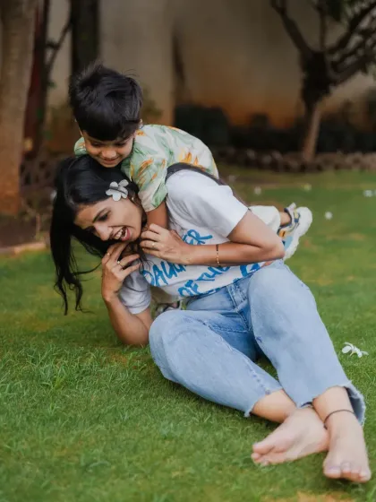 A playful moment on the grass during a mother and son photoshoot. I love capturing the fun and laughter that comes from just enjoying time together as a family.