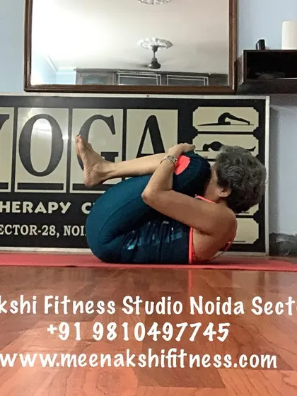 Pavanmuktasana, or Wind-Relieving Pose. This gentle pose is great for the digestive system and releasing the lower back.