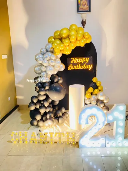 My 21st birthday decorations range from bold and modern to soft and elegant. I use marquee numbers, custom backdrops, and sophisticated balloon arrangements to mark this special occasion.