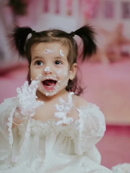 Pure happiness in a handful of cake. I focus on capturing these candid moments of joy that you will treasure forever.
