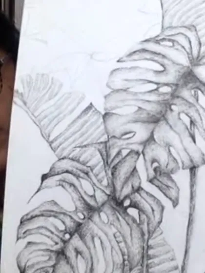 Learning to see and render light and shadow is a core skill we teach. Here, one of our students works on a detailed pencil shading of Monstera leaves, building her confidence in creating depth and form.