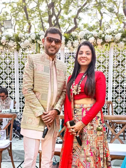 With one of the talented singers from my team. We work closely to curate the perfect playlist of traditional and modern songs for the wedding ceremony.