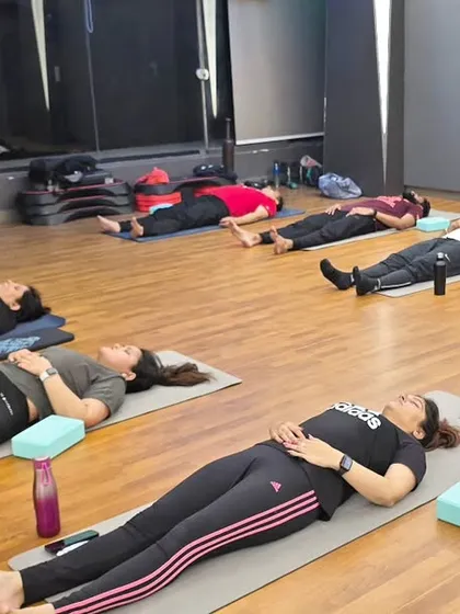 Another view of Savasana. This pose calms the mind, reduces fatigue, and promotes a spiritual awareness that is deeply restorative.