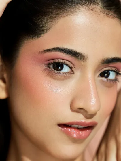 This look is a masterclass in soft glam. The skin is luminous, the eyes are subtly defined, and the overall effect is effortlessly beautiful.