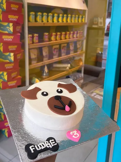 Our classic dog-face cake, customized for Fudge the Pug's 3rd birthday. This design is one of our bestsellers and is available for delivery across India.