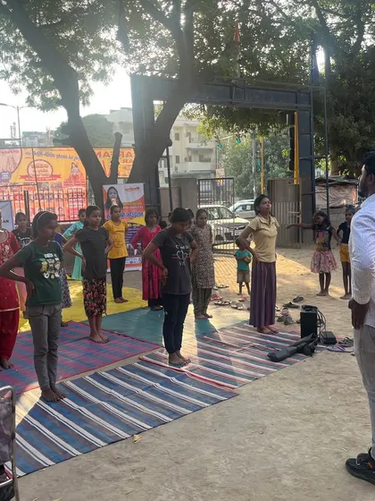 Another angle of an outdoor training session, focusing on warm-ups and basic stances. Fresh air and hard work.