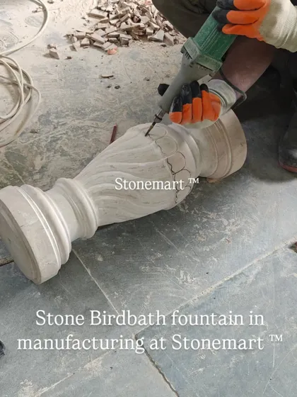 A stone birdbath fountain in manufacturing at Stonemart. This shows the raw form of the pillar before the final shaping and polishing is completed by our skilled craftsmen.