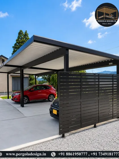 This wide-span carport is engineered to shelter two vehicles without any central pillars, allowing for easy access and parking. The solid roof offers complete protection from the elements, and the slatted side fence provides privacy from the street.