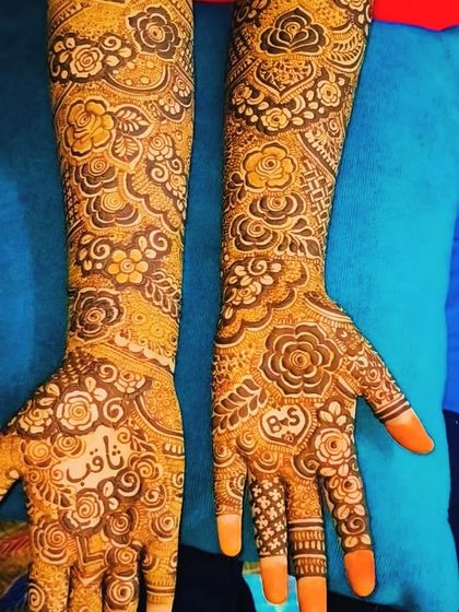 A personalized bridal design with the name 'Saquib' and the initials 'BS' with a heart, making it extra special for the bride.