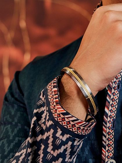 A close-up of the Altruist Kada bracelet, a versatile piece for men. Its design, featuring the signature "Shifting Leaves Chevron," is a story of heritage, elegance, and unmatched craftsmanship.