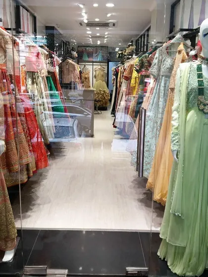 Welcome to our designer outlet in Lajpat Nagar. This view from our storefront gives you a glimpse of the endless racks of authentic designer wear waiting to be discovered, all at incredible discount prices.
