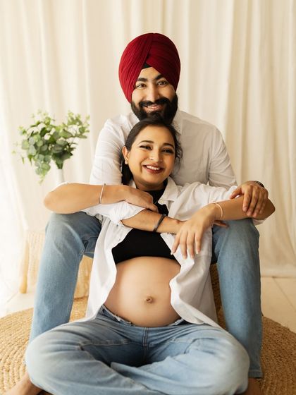 A happy and relaxed portrait of the couple, their smiles showing their excitement for the adventure ahead.