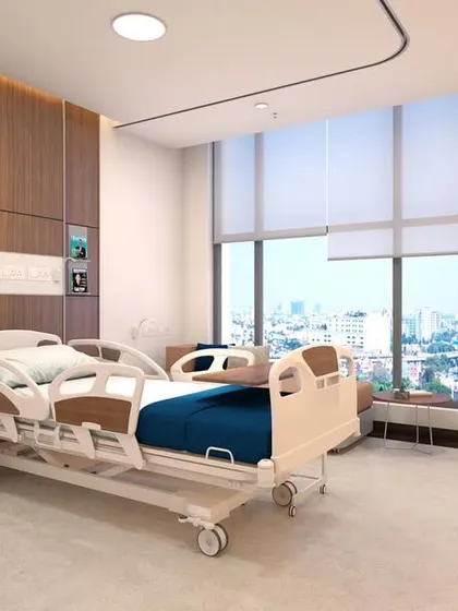 A patient's environment is integral to their recovery. In this private room at AIG Hospitals, we prioritized natural light and expansive city views, creating a serene, comfortable space that feels less clinical and more like a place of rest and healing.