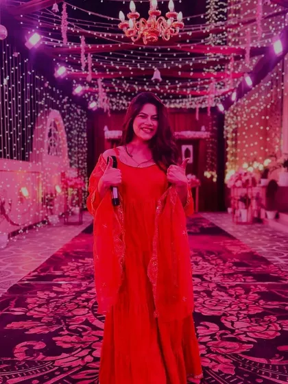 Another pose in the same magical, fairy-lit corridor. The ambiance was perfect for a grand celebration.