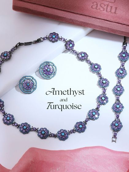 The complete Amethyst and Turquoise set, including the necklace, earrings, and bracelet. This collection is designed to dazzle from every angle with its unique color combination.