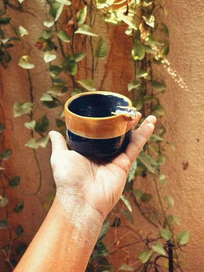 Congratulations to this student on completing her beginner's course. She created a beautiful collection, including a tall vase with leaf imprints and a lovely coiled bowl.