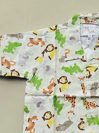 A closer look at the playful jungle animal print. I chose these gentle colors and cute characters to make bedtime fun. The pure cotton fabric ensures a soft and irritation-free sleep for your little explorer.