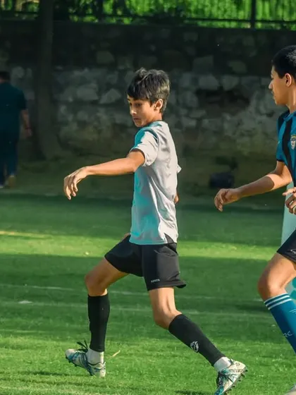 A player runs onto a pass, moving into open space to create an attacking opportunity.
