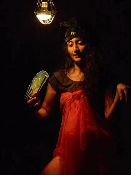 A close-up of the previous moment, highlighting the character's expression. Solo performance is about conveying a world of emotion through subtle gestures and looks.
