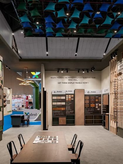 The Realply exhibition space was designed around a wide, interactive central aisle lined with product displays. This linear circulation path provides a sense of grandeur and allows for a clear, organized presentation of the brand's offerings.