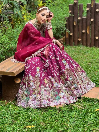 A full-length shot in a beautiful garden setting, capturing the artistic and elegant vibe of this ensemble.