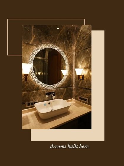 We believe dreams are built in the details. This bathroom vanity shot, with its ornate mirror and warm lighting, perfectly captures our commitment to creating luxurious spaces.